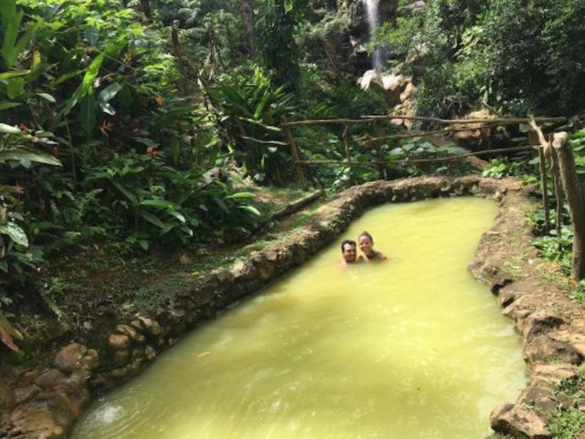 Couple in mud bath